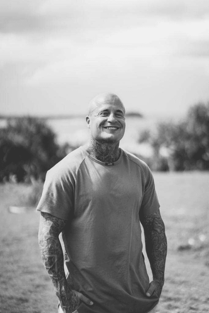 Nick Midgley, candid black-and-white portrait outdoors